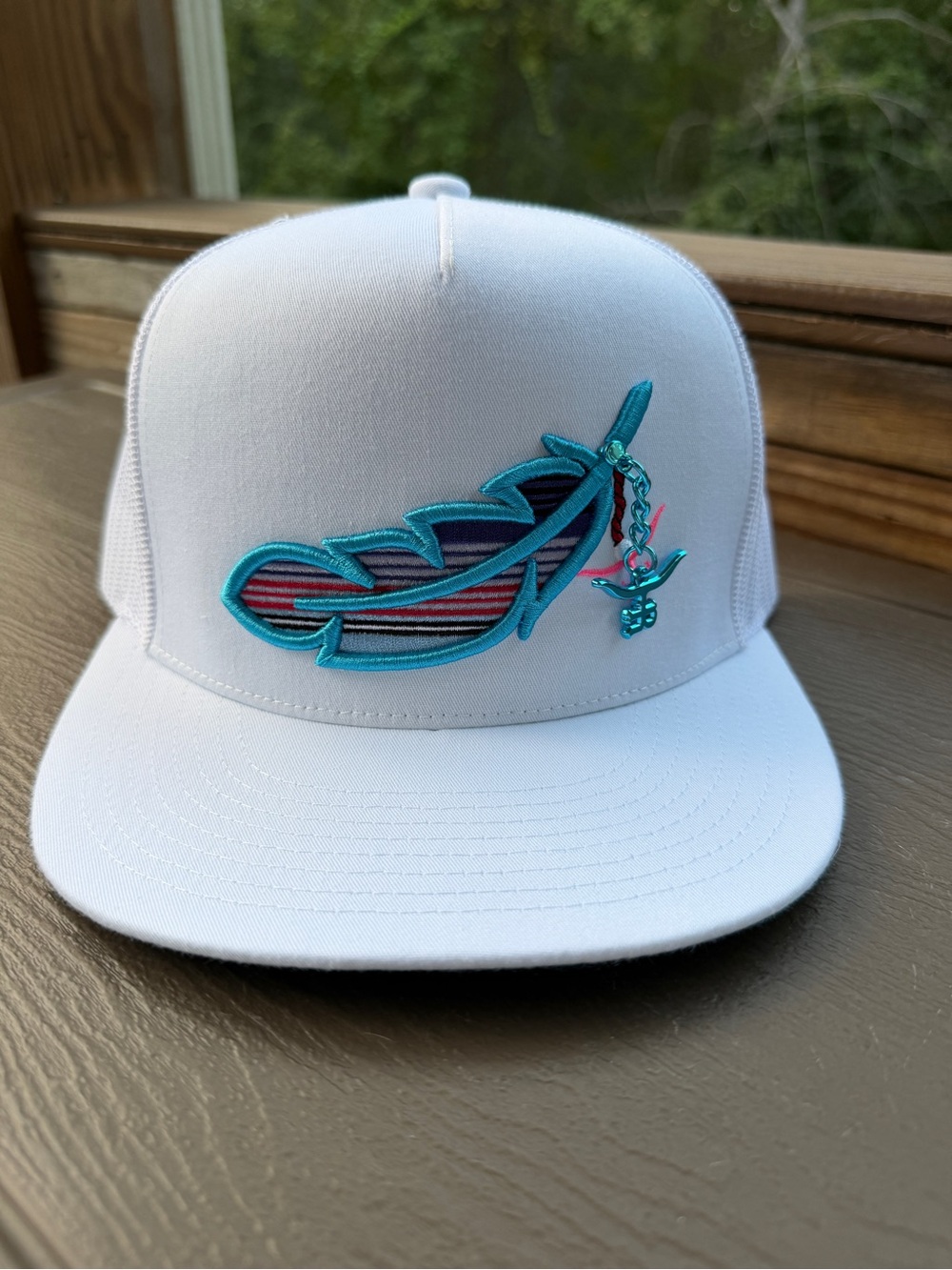 Rancher co brand feathered outlaw Trucker Hat with charm